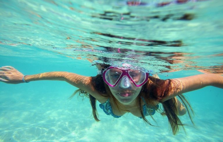 Snorkelers exploring amed