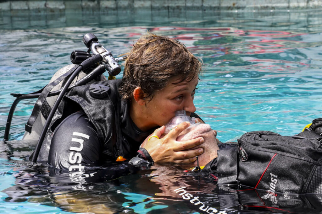 Underwater Rescuer performing skills for a rescue diver